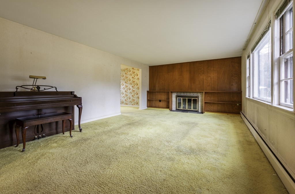 41 Squire Road Winchester, MA 01890 - Photo 7 of 25 a view of a livingroom with furniture and staircase