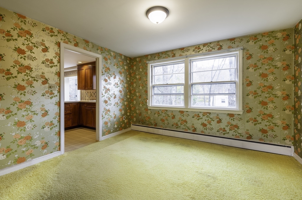 41 Squire Road Winchester, MA 01890 - Photo 9 of 25 a view of an empty room with a window