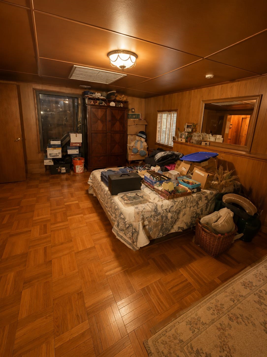 7280 Walsh Road Millington, TN 38053 - Photo 14 of 34 Room featuring wood paneling, a patterned wood-finish floor, and a flush mount ceiling light fixture
