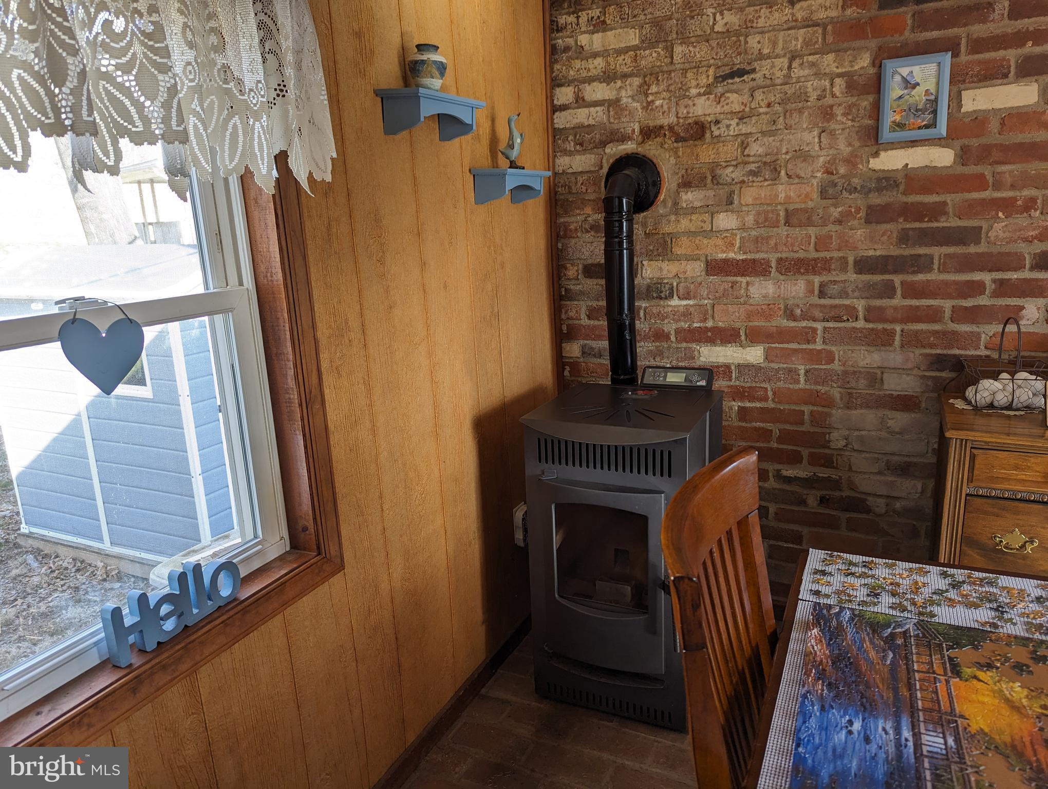 8665 Mormon Church Road Waynesboro, PA 17268 - Photo 10 of 19 PELLET STOVE IN DINING ROOM