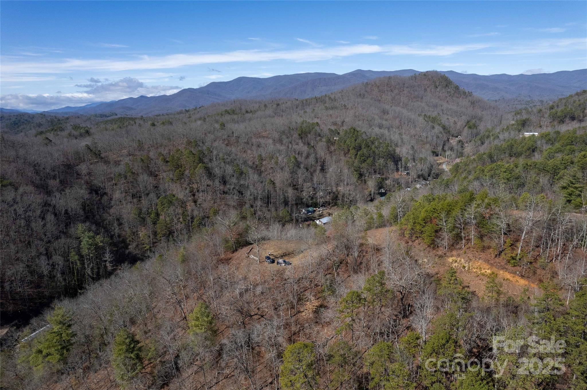 Lot 22 Rusty's Ridge Road Bryson City, NC 28713 - Photo 7 of 10 a view of a lush green hillside and a mountain