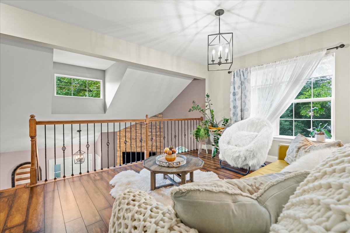 8025 Barrymore Drive Darien, IL 60561 - Photo 24 of 31 a living room with furniture and a window