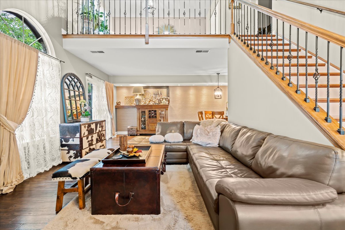8025 Barrymore Drive Darien, IL 60561 - Photo 5 of 31 a living room with furniture and a large window