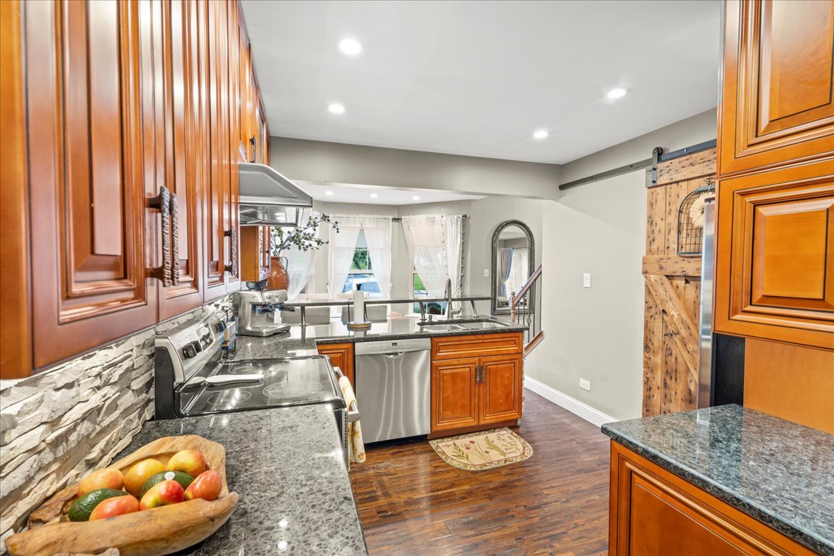 8025 Barrymore Drive Darien, IL 60561 - Photo 10 of 31 a large room with lots of table and chairs