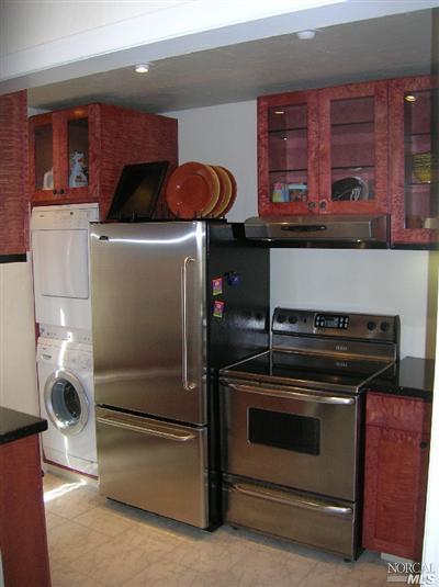 10 Ross Road Sausalito, CA 94965 - Photo 1 of 6 a kitchen with a stove and a microwave
