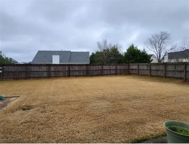 a view of a swimming pool with a lake