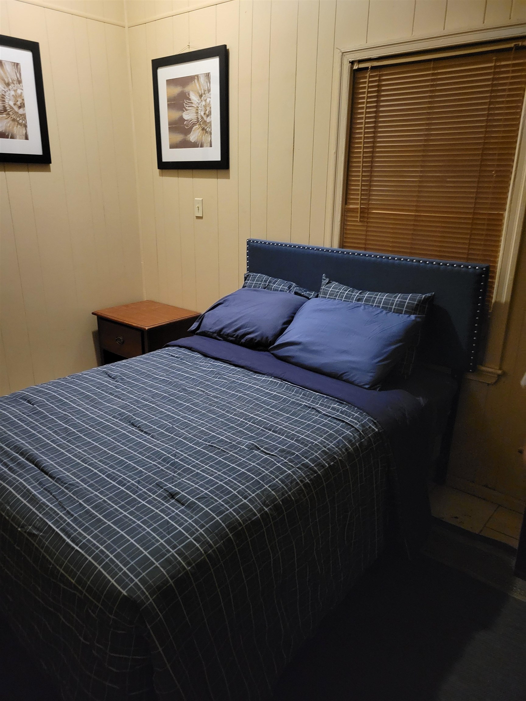 1505 Titus Road Memphis, TN 38111 - Photo 10 of 14 a bedroom with a bed and wall painting