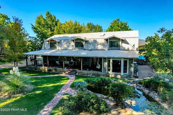 a aerial view of a house with garden