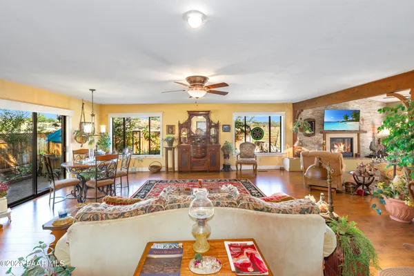 a room with fireplace and wooden floor
