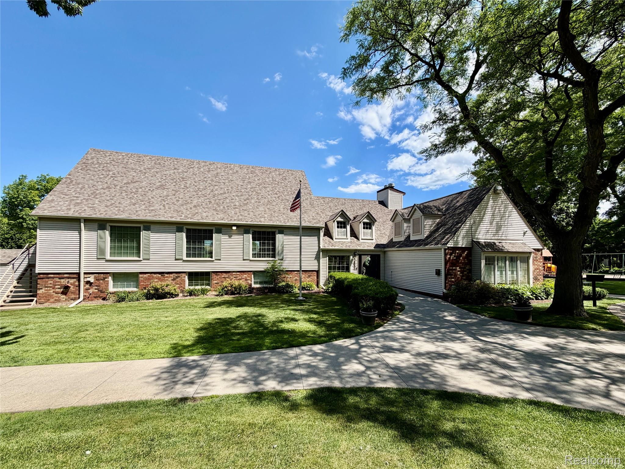 22533 Winfield Road Novi, MI 48375 - Photo 29 of 43 Split-level residence featuring a multi-gabled roofline and a combination of brick and siding exteriors