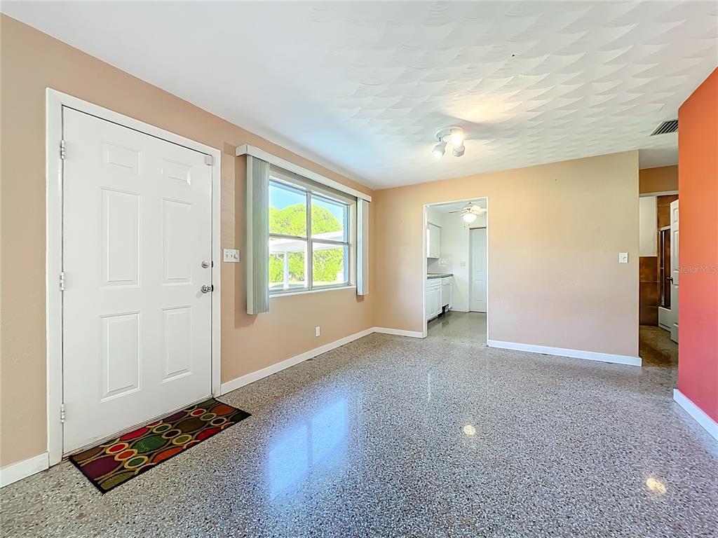 1401 Orange Tree Drive Edgewater, FL 32132 - Photo 12 of 46 an empty room with closet and windows