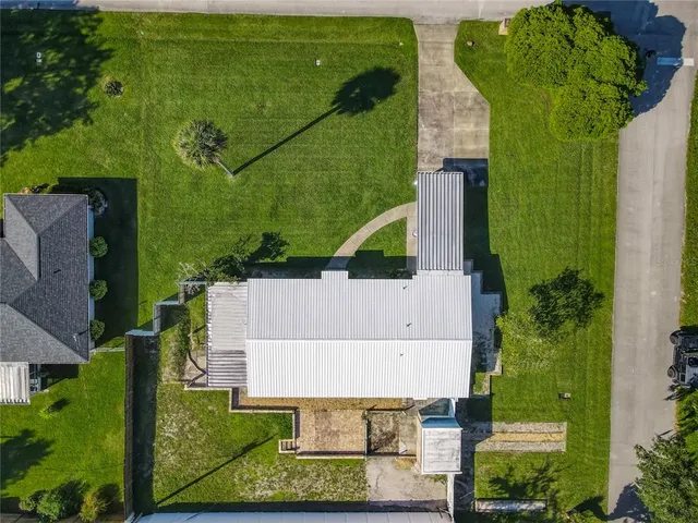 a view of a house with a big yard