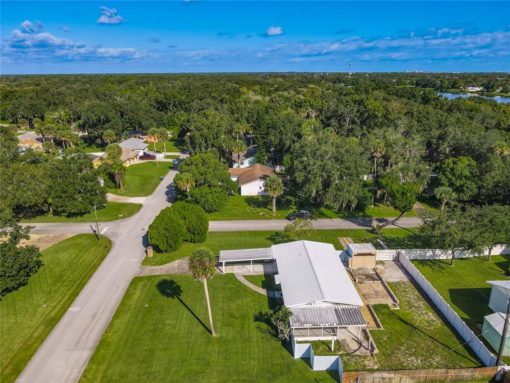 1401 Orange Tree Drive Edgewater, FL 32132 - Photo 40 of 46 a view of an outdoor space and a lake view