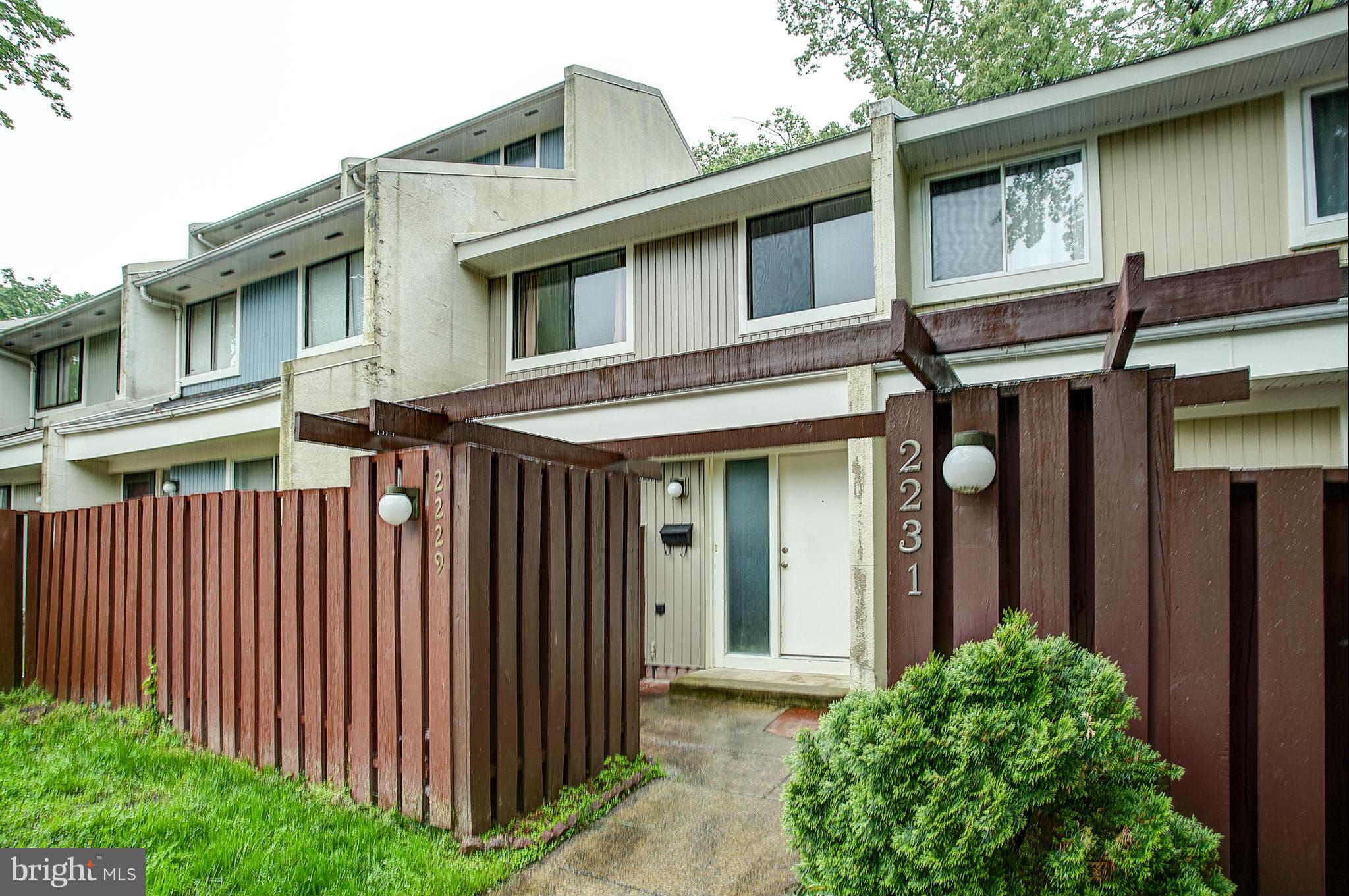 2229 Southgate Square Reston, VA 20191 - Photo 1 of 1 a view of a house with brick walls and plants