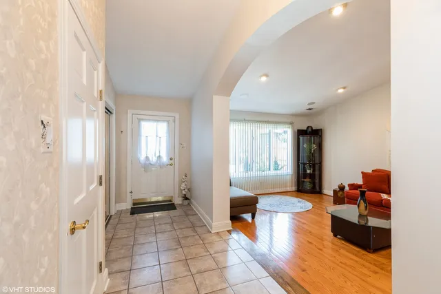 a spacious bathroom with a tub and shower