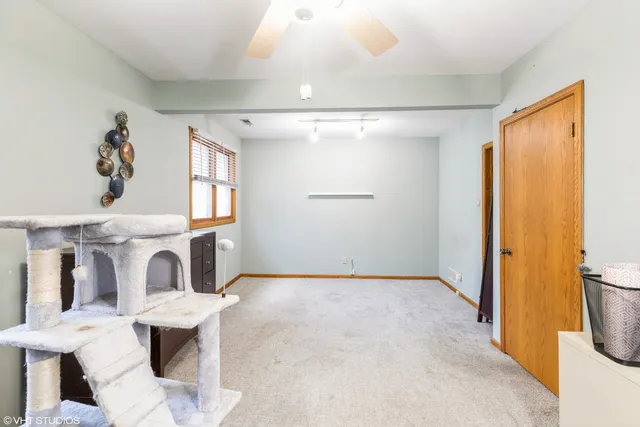 a view of entryway and hall with a dining table