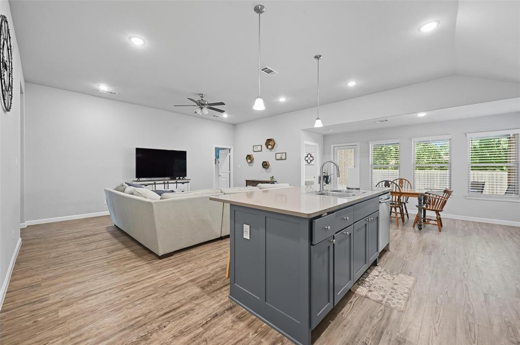 977 Sam Street Springtown, TX 76082 - Photo 27 of 29 a living room with furniture and flat screen tv
