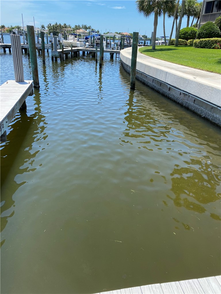 1880 Bay Road, Unit 220I Vero Beach, FL 32963 - Photo 27 of 35 a view of a lake with houses