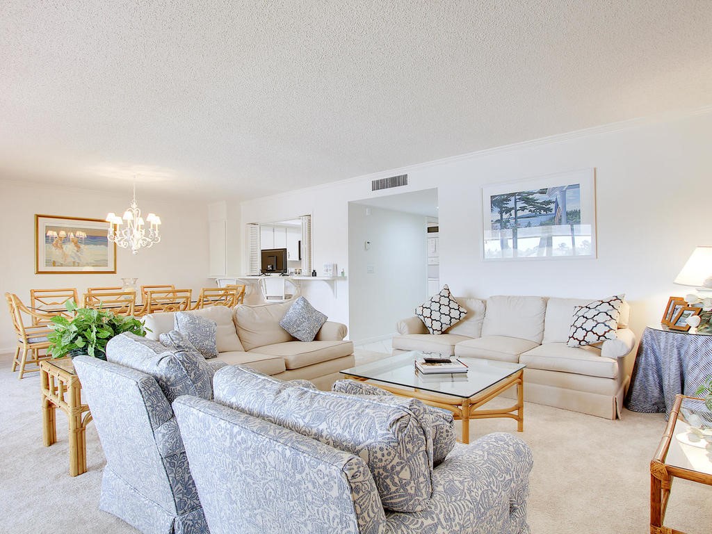 1880 Bay Road, Unit 220I Vero Beach, FL 32963 - Photo 5 of 35 a living room with furniture and a large window