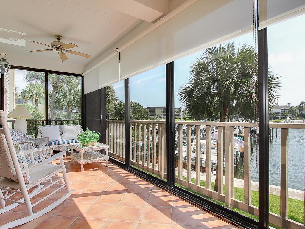 1880 Bay Road, Unit 220I Vero Beach, FL 32963 - Photo 6 of 35 a balcony with furniture