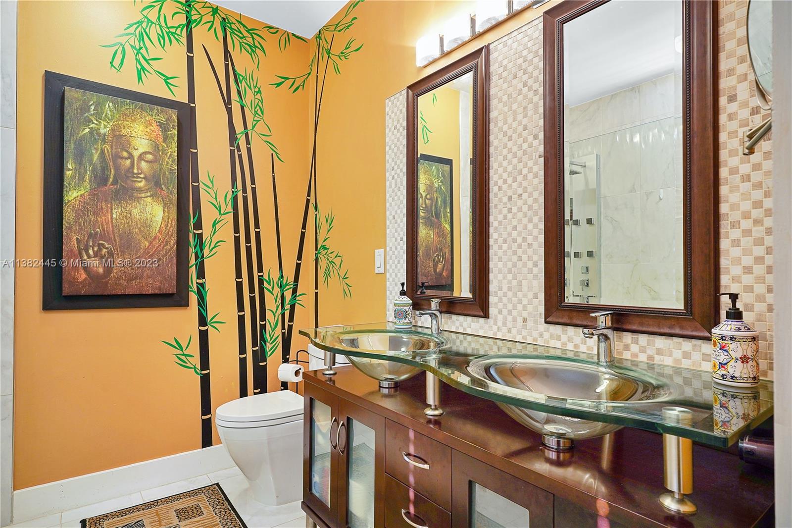 3078 Southwest 153rd Path, Unit 3078 Miami, FL 33185 - Photo 22 of 36 a bathroom with a sink a toilet and a mirror