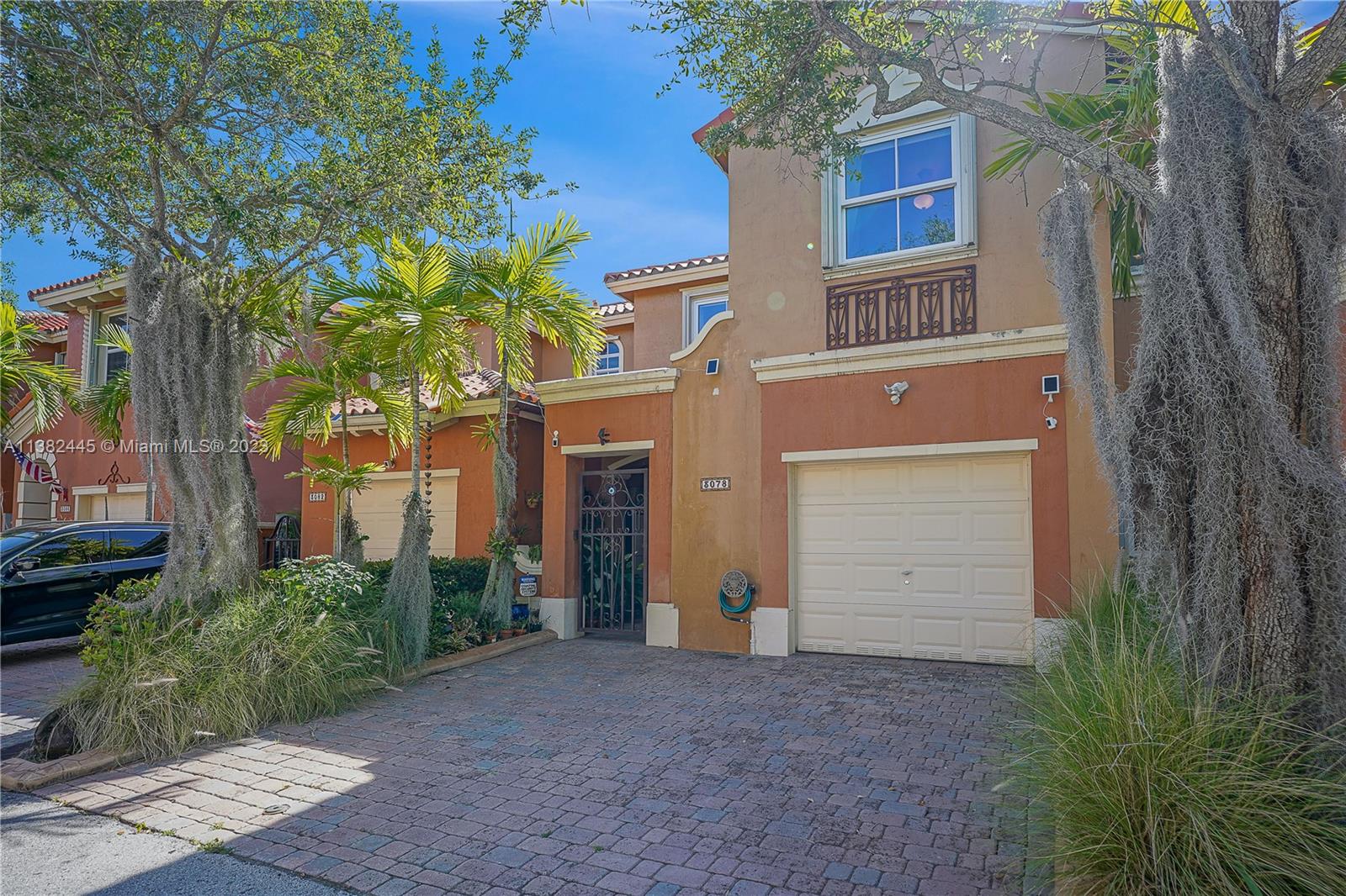 3078 Southwest 153rd Path, Unit 3078 Miami, FL 33185 - Photo 7 of 36 a house that has a tree in front of the house