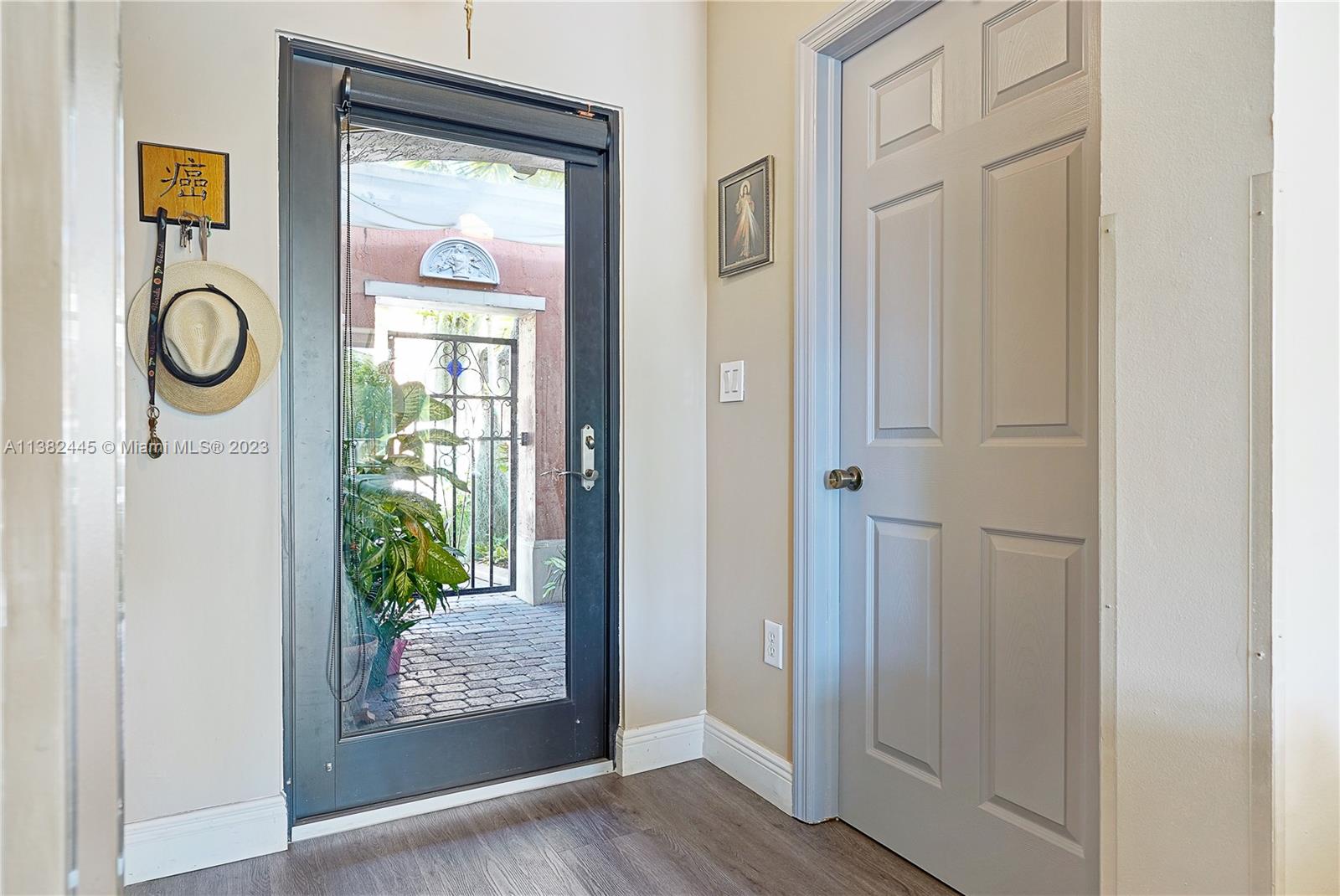 3078 Southwest 153rd Path, Unit 3078 Miami, FL 33185 - Photo 10 of 36 a view of entryway with wooden floor