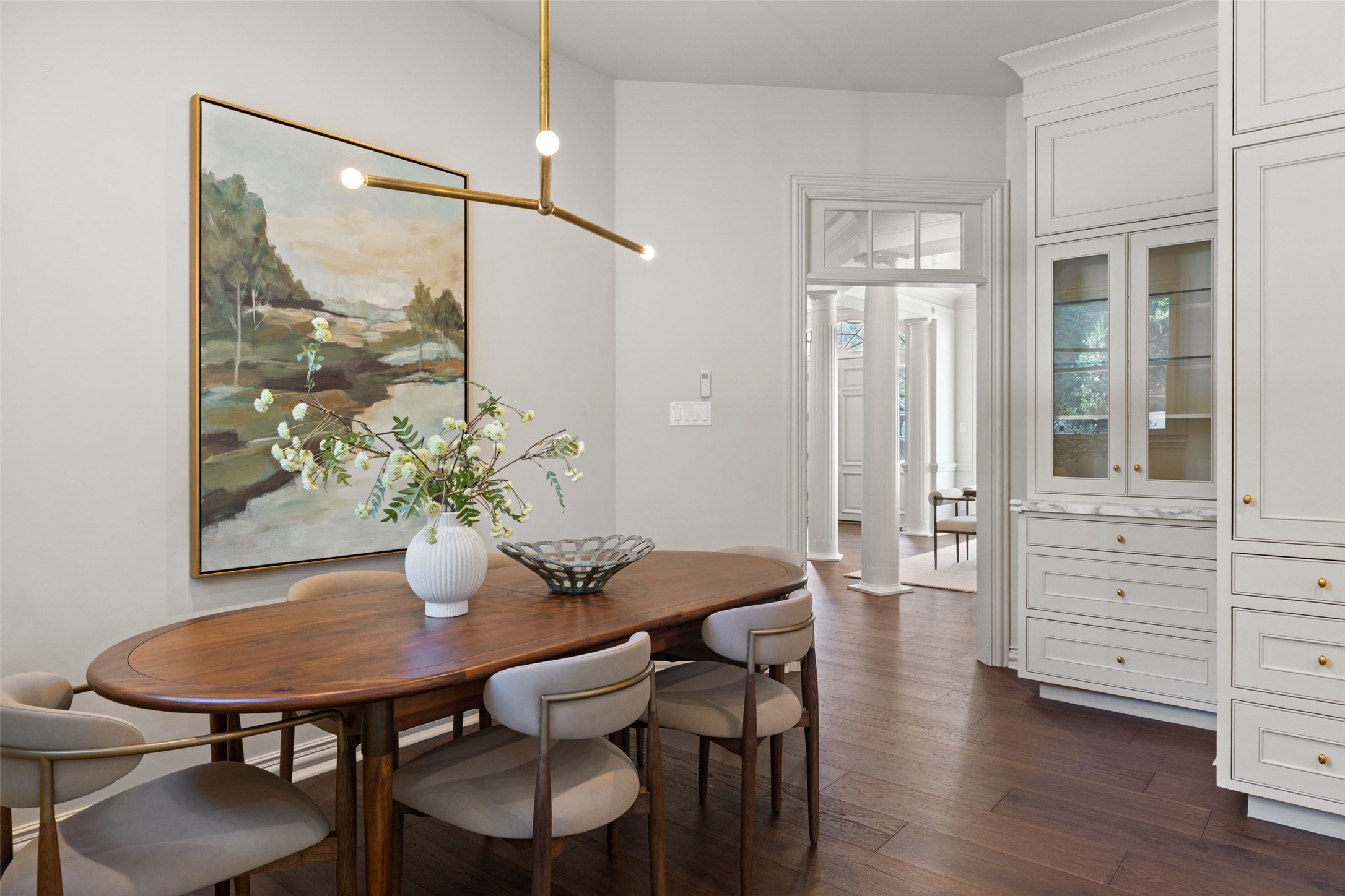 4201 Green Cliffs Road Austin, TX 78746 - Photo 15 of 40 Featuring overhead statement lighting, this dining nook provides a comfortable, space-efficient setup for casual dining and hosting