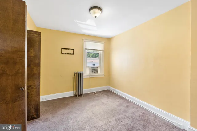 a view of a livingroom with a window
