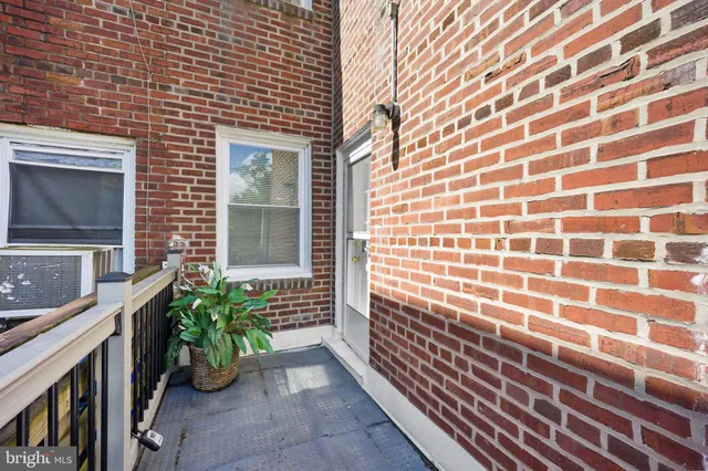 a view of a house with a large window
