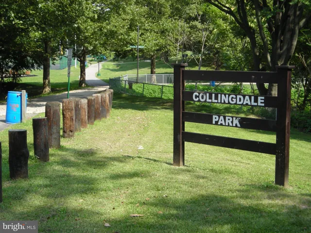 a view of a park with welcome board