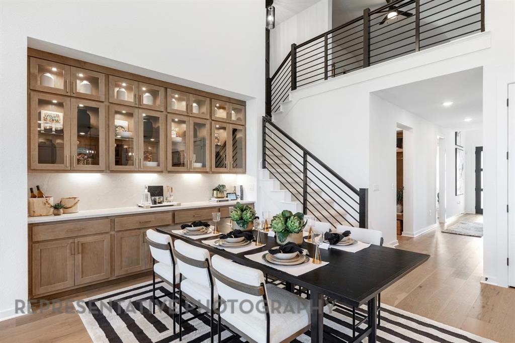 2132 Nerello Way Rockwall, TX 75032 - Photo 27 of 40 a view of a dining room with furniture and window