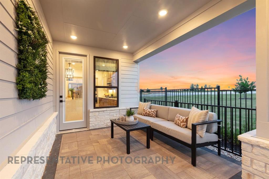 2132 Nerello Way Rockwall, TX 75032 - Photo 37 of 40 a building outdoor space with patio furniture and a potted plant