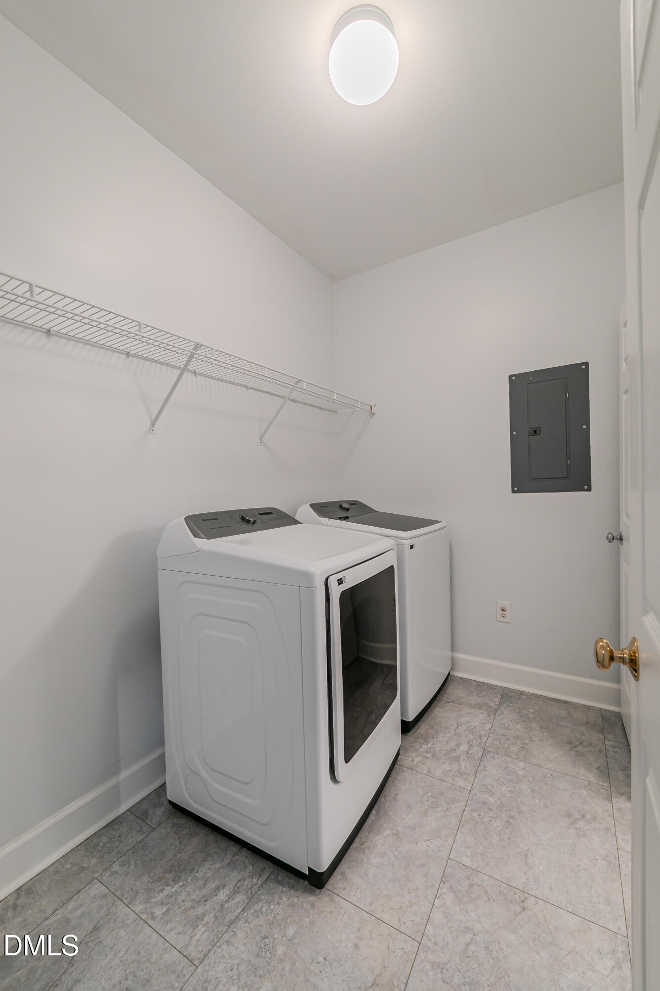 116 Northbrook Drive, Unit 305 Raleigh, NC 27609 - Photo 40 of 43 a utility room with dryer and washer