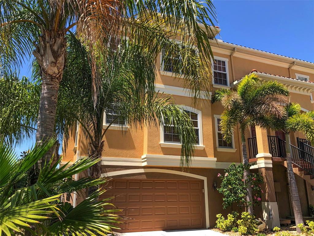 6517 Channelside Drive New Port Richey, FL 34652 - Photo 1 of 31 a view of a house with a yard