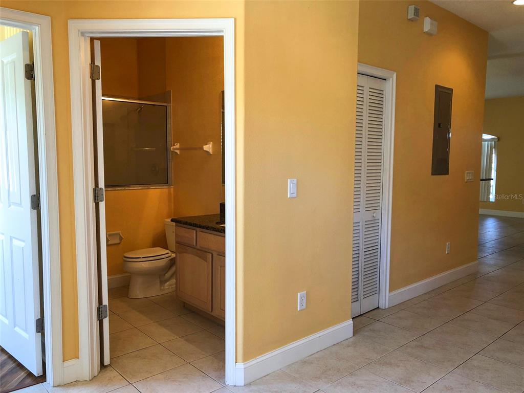 6517 Channelside Drive New Port Richey, FL 34652 - Photo 12 of 31 a bathroom with a toilet and a shower
