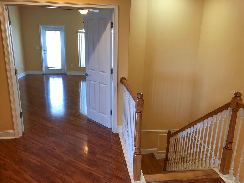 6517 Channelside Drive New Port Richey, FL 34652 - Photo 17 of 31 a view of entryway with wooden floor