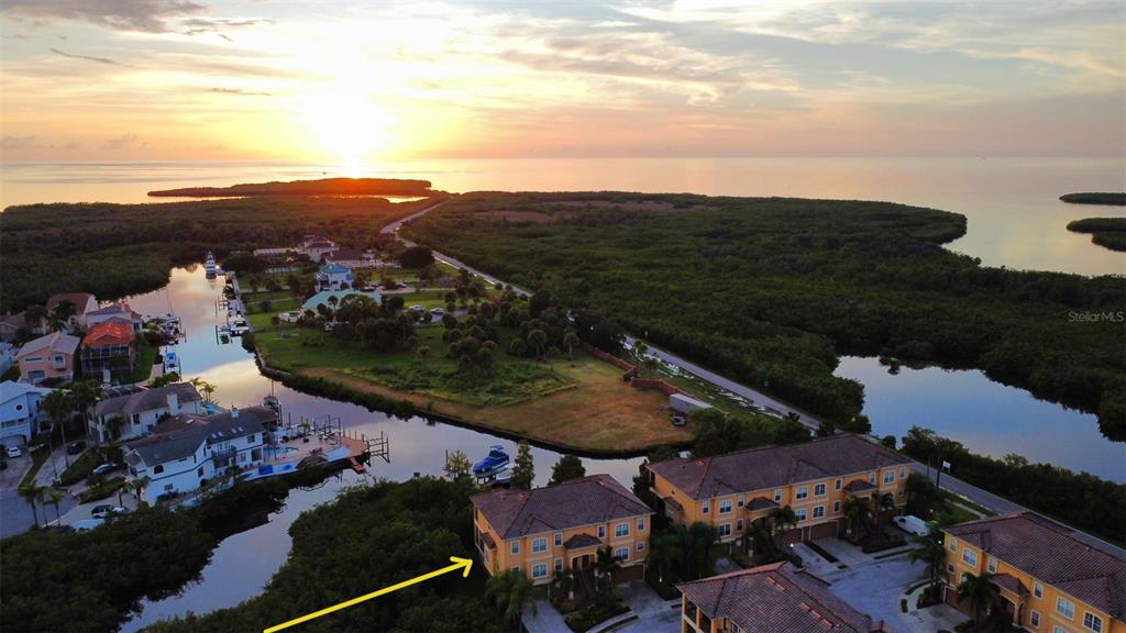 6517 Channelside Drive New Port Richey, FL 34652 - Photo 28 of 31 an aerial view of residential houses with outdoor space