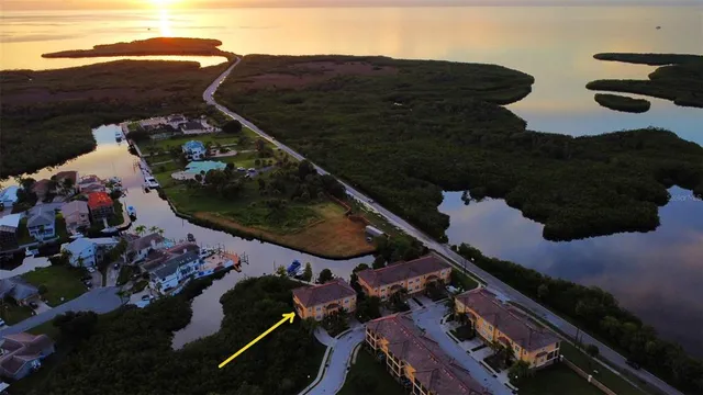 an aerial view of house with yard