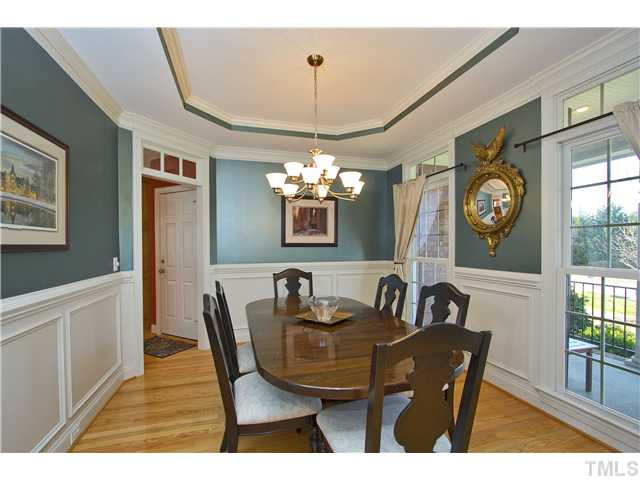 8717 Oregon Inlet Court Raleigh, NC 27603 - Photo 7 of 25 Dining room is a nice size! Room for table, 6 chairs and a hutch (not shown). Dining Room