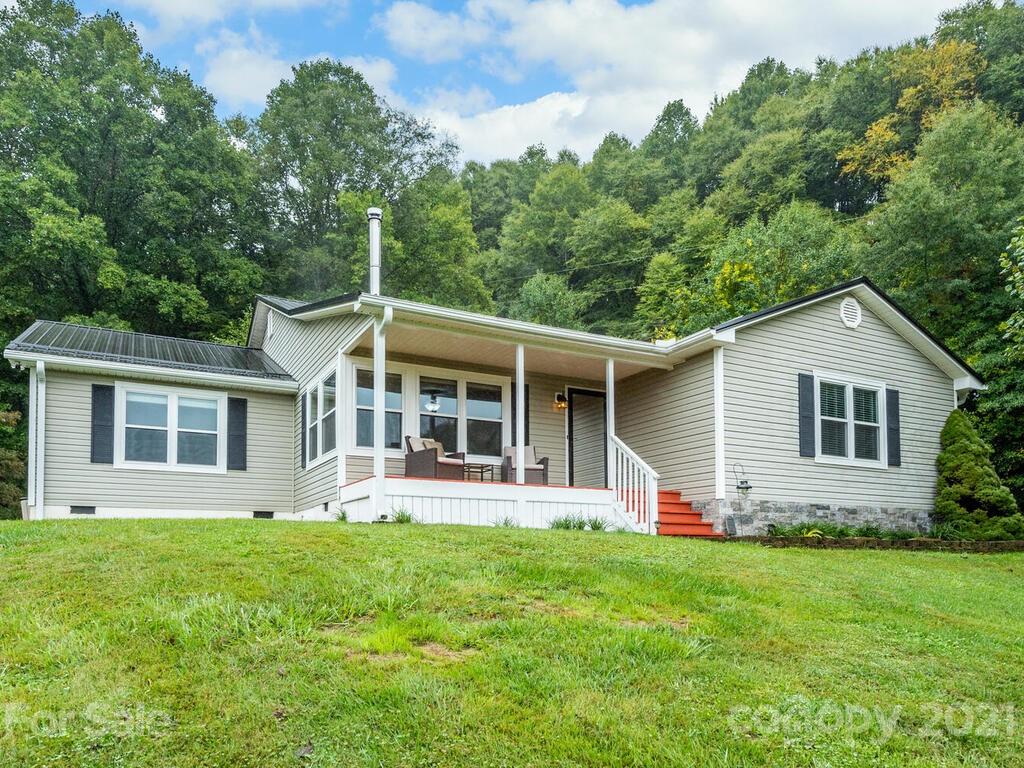 595 Hunters Ridge Road, Unit 20 Canton, NC 28716 - Photo 1 of 47 front view of a house with a yard