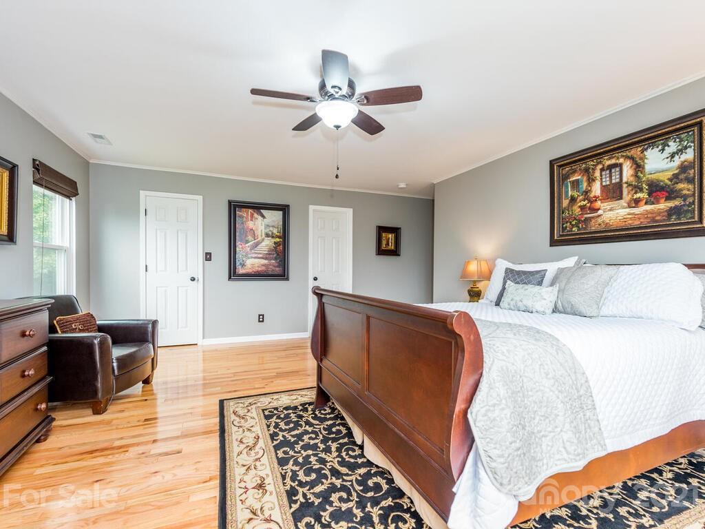 595 Hunters Ridge Road, Unit 20 Canton, NC 28716 - Photo 15 of 47 a bed room with a bed and window