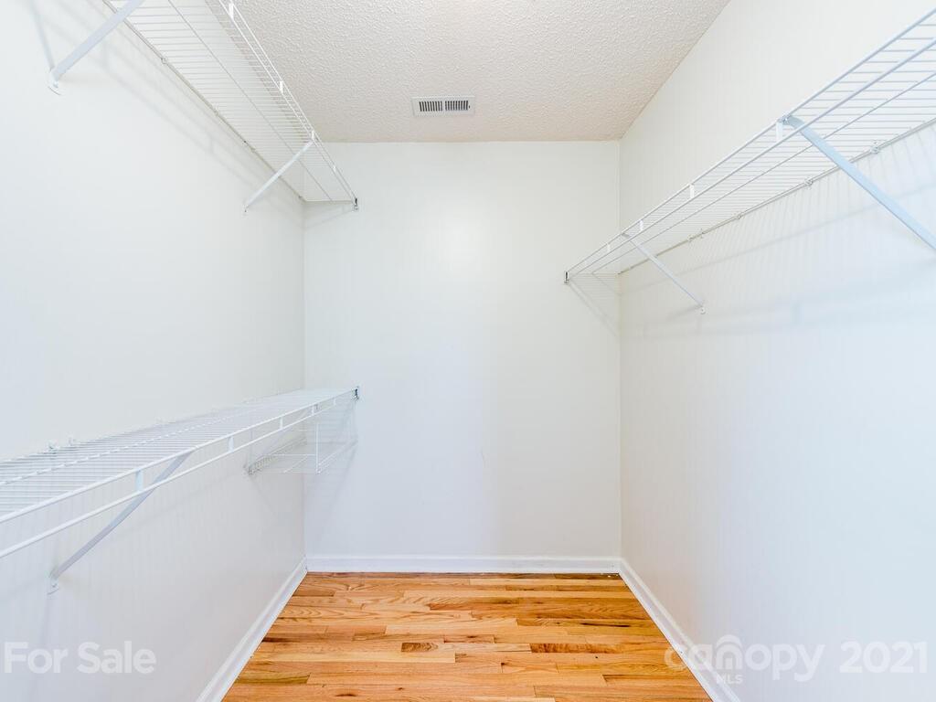 595 Hunters Ridge Road, Unit 20 Canton, NC 28716 - Photo 19 of 47 a view of room with racks on the wall