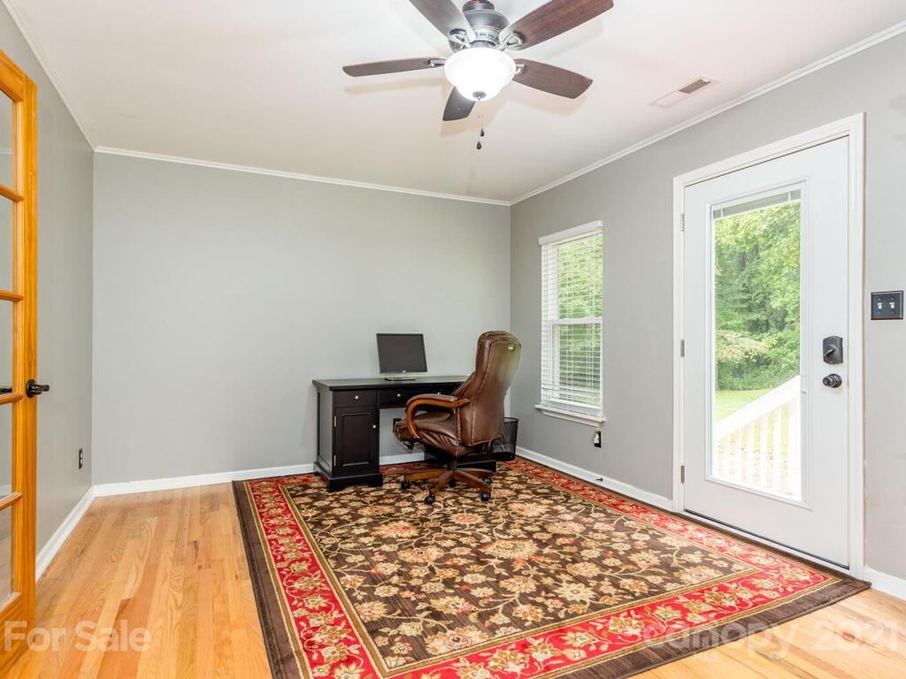 595 Hunters Ridge Road, Unit 20 Canton, NC 28716 - Photo 20 of 47 a view of a workspace with furniture and a window