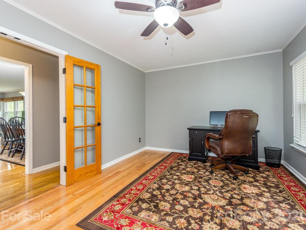 595 Hunters Ridge Road, Unit 20 Canton, NC 28716 - Photo 21 of 47 a workspace with furniture window and wooden floor