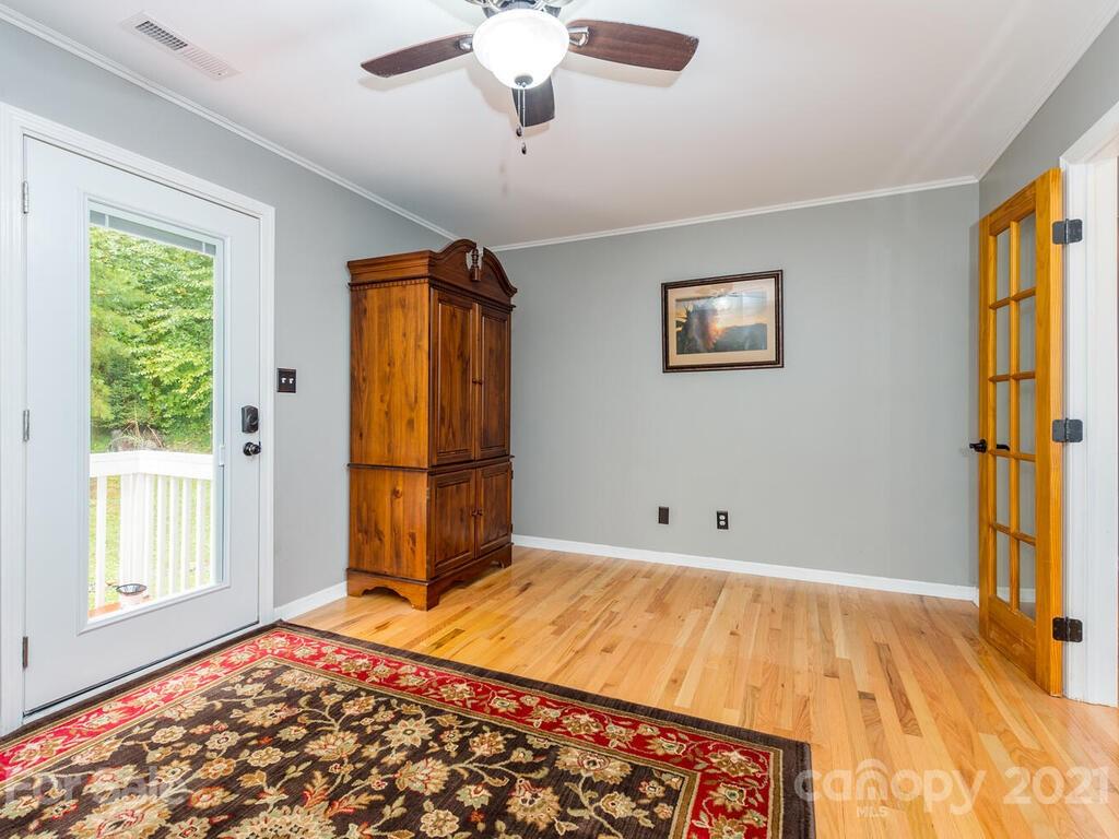 595 Hunters Ridge Road, Unit 20 Canton, NC 28716 - Photo 22 of 47 a bedroom with a bed and a window
