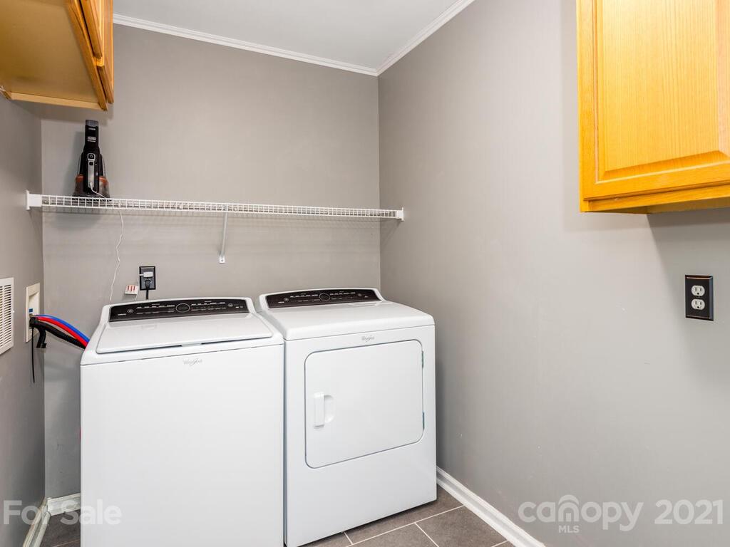 595 Hunters Ridge Road, Unit 20 Canton, NC 28716 - Photo 30 of 47 a utility room with dryer and washer