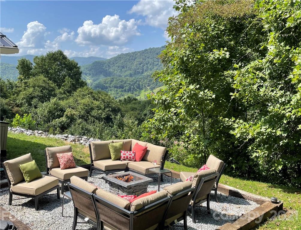 595 Hunters Ridge Road, Unit 20 Canton, NC 28716 - Photo 32 of 47 a outdoor living space with furniture and city view
