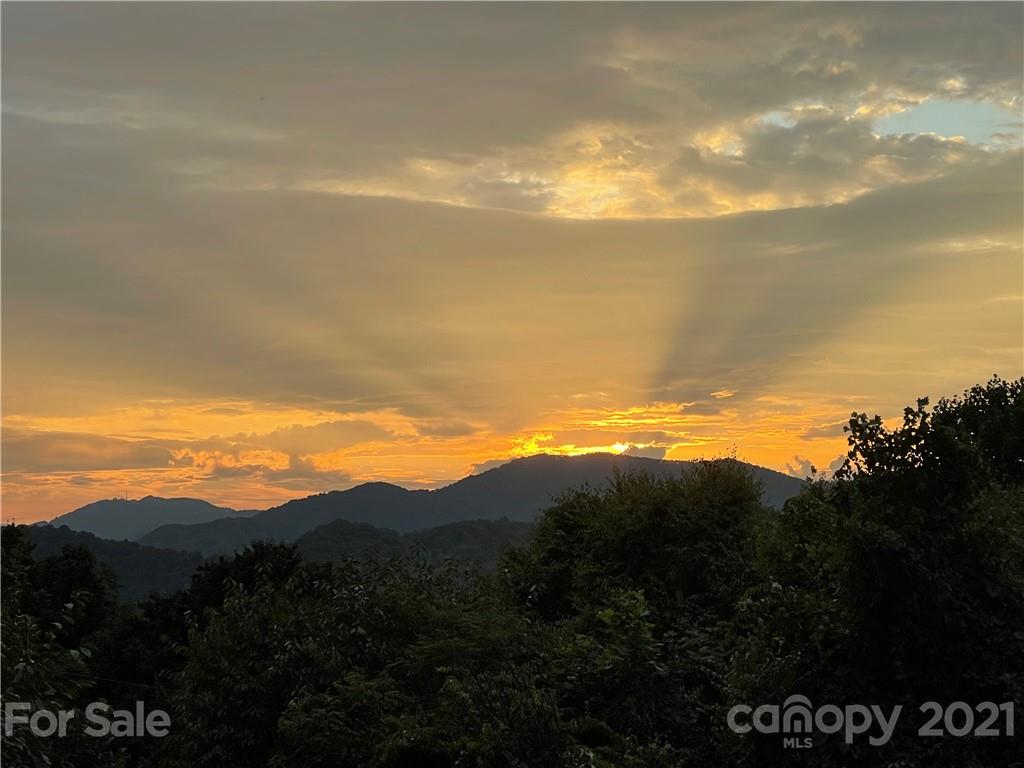 595 Hunters Ridge Road, Unit 20 Canton, NC 28716 - Photo 43 of 47 a view of ocean and mountains
