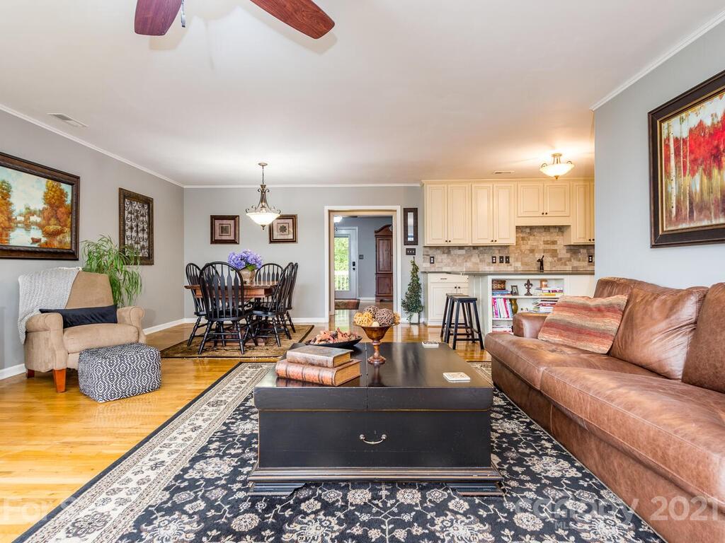 595 Hunters Ridge Road, Unit 20 Canton, NC 28716 - Photo 6 of 47 a living room with furniture and a rug